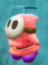 A pink Fly Guy in Yoshi's Crafted World.