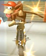 File:MKW Diddy Kong Bike Trick Up.png