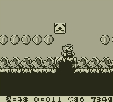 Small Wario, surrounded by Piranha Plants.
