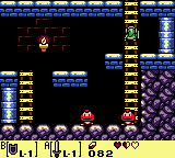 Link encountering two Goombas in a Tail Cave passage of The Legend of Zelda: Link's Awakening DX.