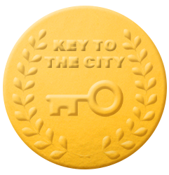 File:TSMBM Key to the City Emblem.png