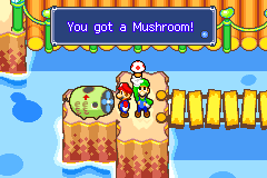 Luigi getting a Mushroom from a fan in Hoohoo Village of Mario & Luigi: Superstar Saga.