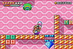 A glass bird and Wario in a pink area