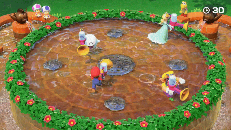 Gameplay of the Soak or Croak minigame in Super Mario Party, with the heroic Mario knocking out the vile Wario during the minigame.