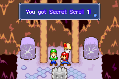 Mario and Luigi finding the Secret Scroll 1 in the rock found in the Hammerhead Bros. cave in Beanbean Outskirts of Mario & Luigi: Superstar Saga.