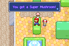 Mario getting a Super Mushroom from a Toad in Toadtown Square of Mario & Luigi: Superstar Saga.