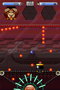 A screenshot of the battle against Donkey Kong in Room 5-DK from Mario vs. Donkey Kong 2: March of the Minis.