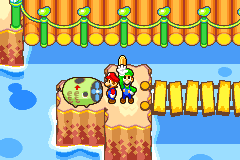 Luigi getting a Coin from a fan in Hoohoo Village of Mario & Luigi: Superstar Saga.