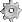 Sprite of a cog from Donkey Kong Country 3 for Game Boy Advance