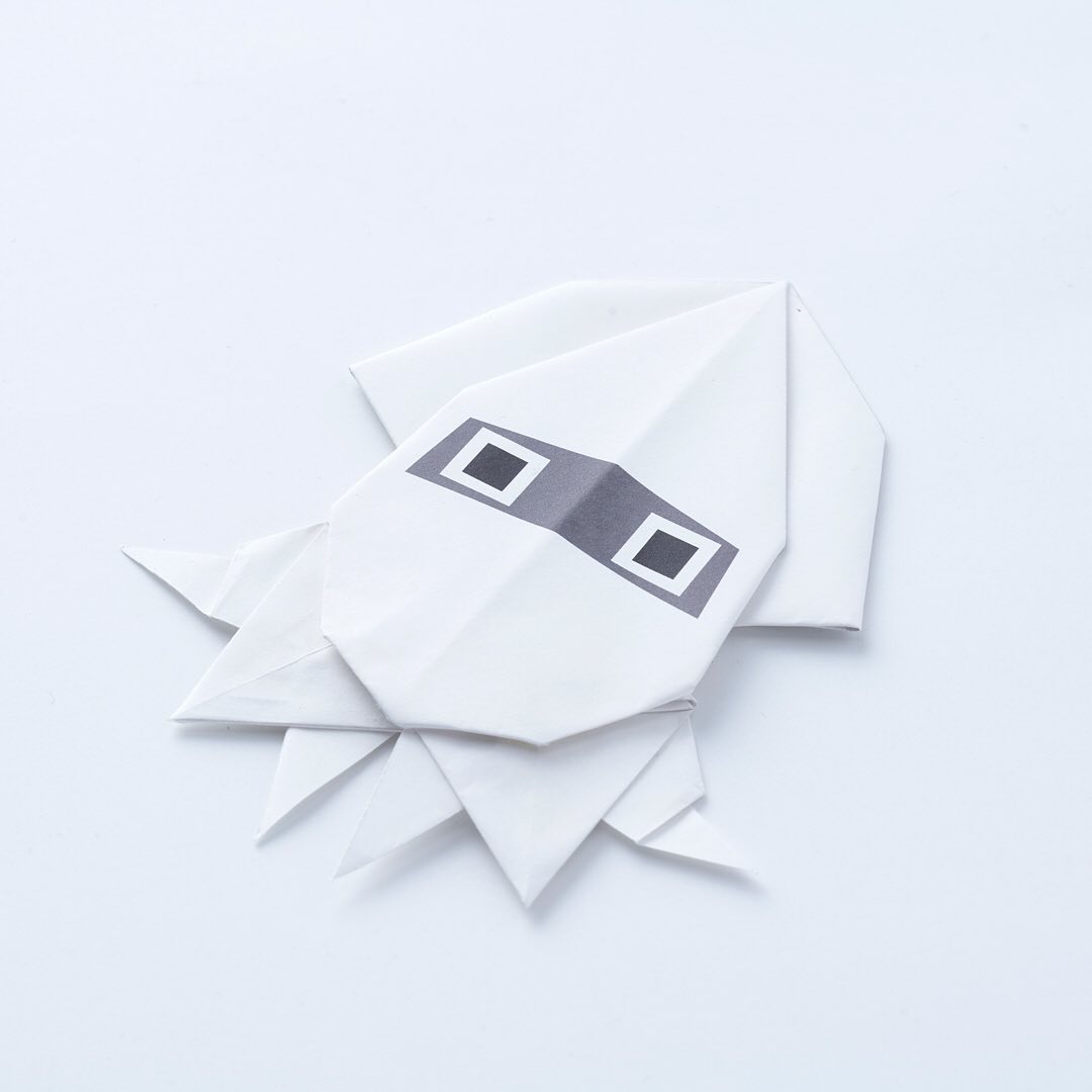 Photo of an origami Blooper craft promoting the game from Nintendo Co., Ltd.'s Instagram account