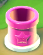 Screenshot of the Pink Coin Pipe in Super Mario Run, It has been placed somewhere in the kingdom.