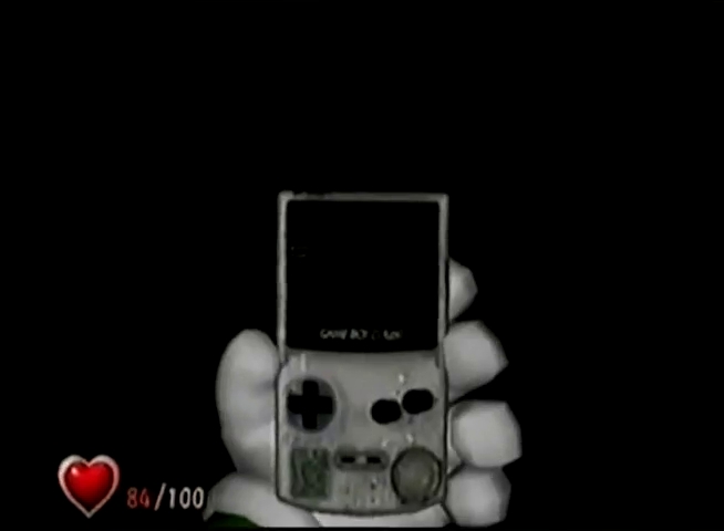 File:LM Prerelease Holding the Game Boy Horror.jpg