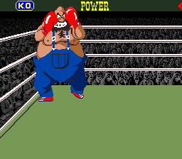 Screenshot of the arcade version of Super Punch-Out!!, showing Mario, Luigi, Donkey Kong, and Donkey Kong Jr. in the audience
