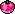 The sprite form of the Pink Berry from Super Mario World.