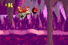 Donkey Kong and Diddy Kong jumping at an Extra Life Balloon at the end of the first Bonus Area of Jungle Hijinxs in the Game Boy Advance version of Donkey Kong Country