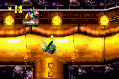 The Kongs drive through the second Bonus Area of Demolition Drain-Pipe in the Game Boy Advance remake of Donkey Kong Country 3.