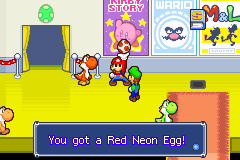 Mario and Luigi getting the Red Neon Egg from starving red Yoshi in Yoshi Theater of Mario & Luigi: Superstar Saga.