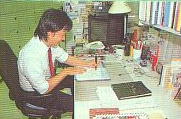 A game designer hard at work working on Super Mario Bros. 3. Scan of Nintendo Power.