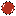 A red Spiny Egg as it appears in Super Mario Bros. 3