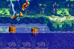 Dixie Kong and Kiddy Kong hopping between barrels across water, narrowly missing the lightning in Lightning Lookout