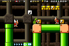 Gameplay of World 7-1 (Super Mario Bros. 3) in Super Mario Advance 4: Super Mario Bros. 3, showing among other things Frog Mario, two Koopa Paratroopas, a Music Block, and some other blocks.