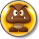 Sprite of a Goomba Coin, from Puzzle & Dragons: Super Mario Bros. Edition.