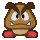 Sprite of a Goomba from the Audience, facing the viewer, from Paper Mario: The Thousand-Year Door.