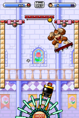 A screenshot of the battle against Donkey Kong in Boss Game 6 from Mario vs. Donkey Kong 2: March of the Minis.