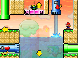 A screenshot of Room 3-2 from Mario vs. Donkey Kong 2: March of the Minis, featuring a Water Valve pouring water into the level.