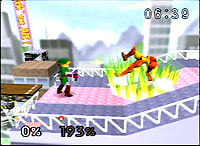 A pre-release screenshot showing Saffron City's pink and purple rooftops. Other pre-release objects appear in the stage scenery.