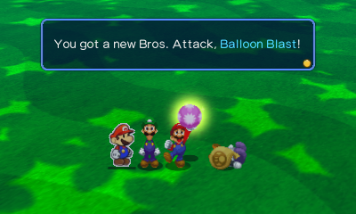 Mario picking up the Balloon Blast Bros. Attack after Nabbit dropped it in Skyjinks with Nabbit mission of Mario & Luigi: Paper Jam.