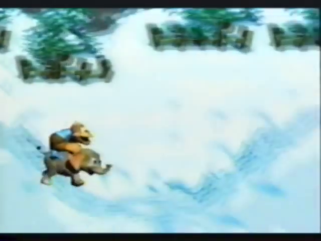 Kiddy rides Ellie in a snow level (likely Frosty Frolics) in the Donkey Kong Country 3 E3 1996 trailer.