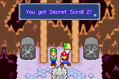 Mario and Luigi finding the Secret Scroll 2 in the rock found in the Hammerhead Bros. cave in Beanbean Outskirts of Mario & Luigi: Superstar Saga.