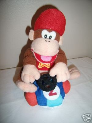 File:Diddy Kong with car BDA plush.png