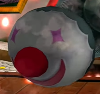 A clown missile being shot at Wario in Wario World.