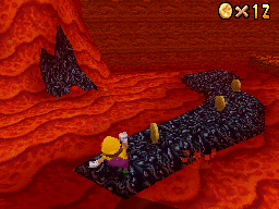 Wario inside the volcano at Lethal Lava Land