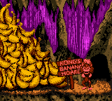 The Kongs celebrate their recovered banana hoard in the original (left) and the Game Boy Color version (right).