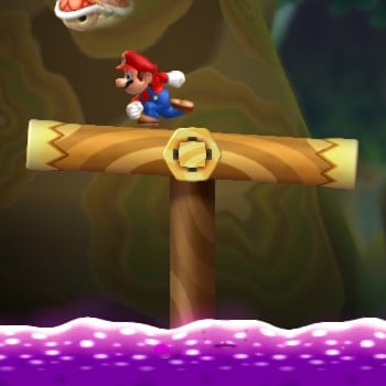 File:NSMBU Screenshot Seesaw Log Bridge.jpg