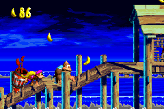 Kiddy Kong and Dixie Kong run away from a Kracka in Stormy Seas from Donkey Kong Country 3 for Game Boy Advance