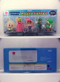 A set of figurines including Toad, Peach, Mario, Luigi, and Yoshi