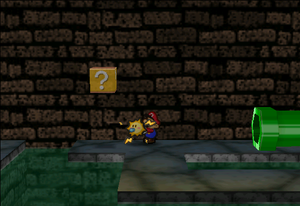 Image of Mario revealing a hidden ? Block in Toad Town Tunnels, in Paper Mario.