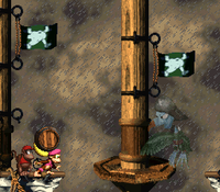 Diddy and Dixie Kong in a boss fight against Kreepy Krow in Donkey Kong Country 2: Diddy's Kong Quest