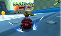 Princess Peach driving on Wii Coconut Mall.