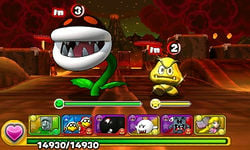 Screenshot of a Gold Goomba sighting in World 8-7, from Puzzle & Dragons: Super Mario Bros. Edition.