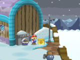Mario next to the Shine Sprite at the very right of Fahr Outpost's village