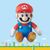 Mario plush from Super Nintendo World with special edition foot emblem.