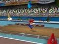 Mario landing a jump.