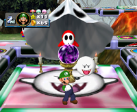View of the Boo House from Mario Party 4. Luigi has just stolen a Star from Waluigi.