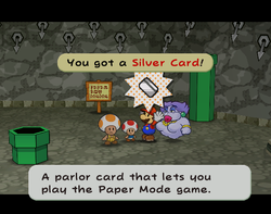 Mario getting Silver Card from Pine T. Jr. in Rogueport Sewers of Paper Mario: The Thousand-Year Door.