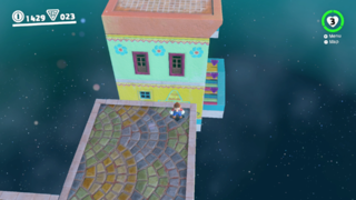 On a rotating building in the secret area with the "Strange Neighborhood" Power Moon.